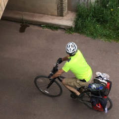 Cyclists biking under Eastern Continental Divide Tunnel