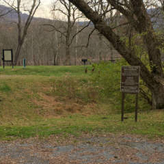 Sign for Fifteen Mile Creek near bridge